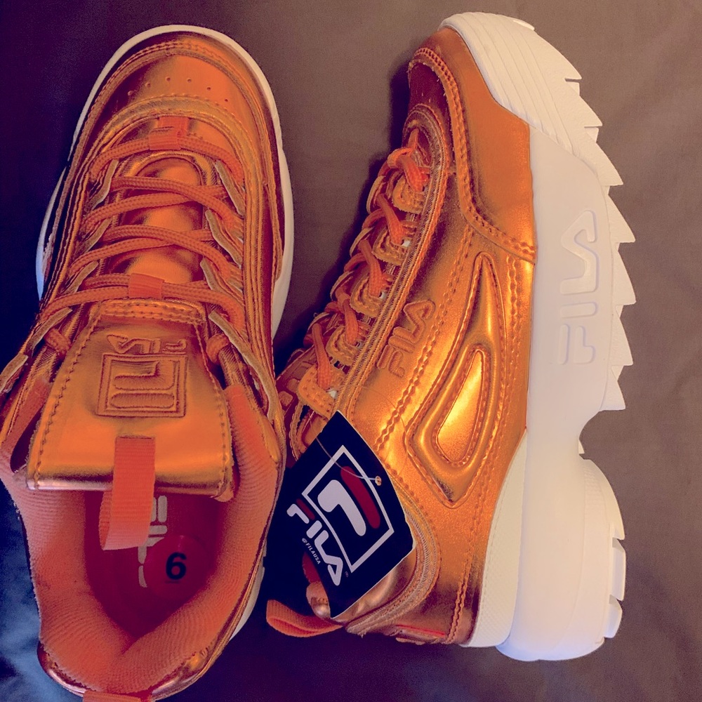 Kids shiny orange filas size 6